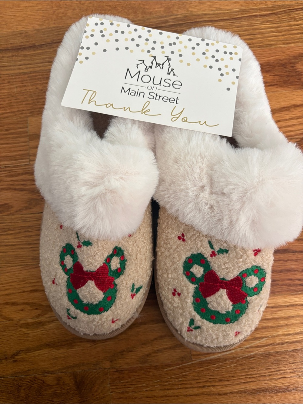 Mickey Mouse Christmas slippers.  Women's Cream Holiday Plush Slippers